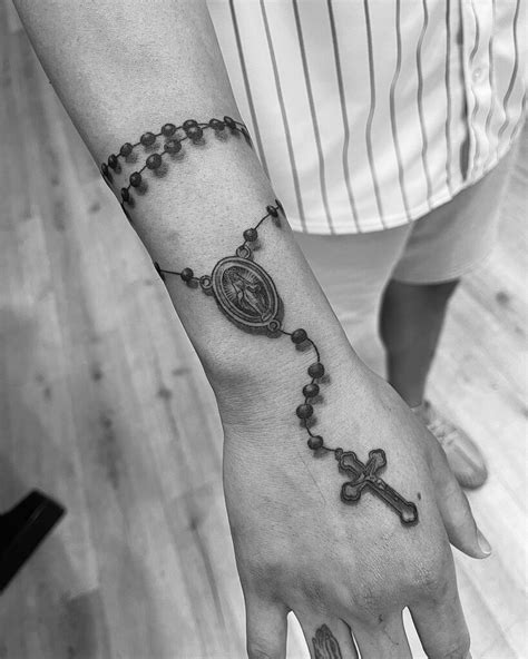 12 Hand Rosary Tattoo Ideas To Inspire You