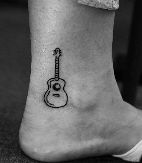 15 Best Guitar Tattoo Designs With Meanings Guitar Tattoo Guitar