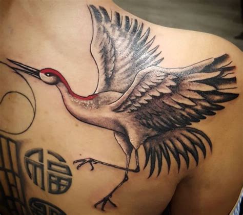 19 Stunning Crane Tattoos And Their Meanings Crane Tattoo Cover