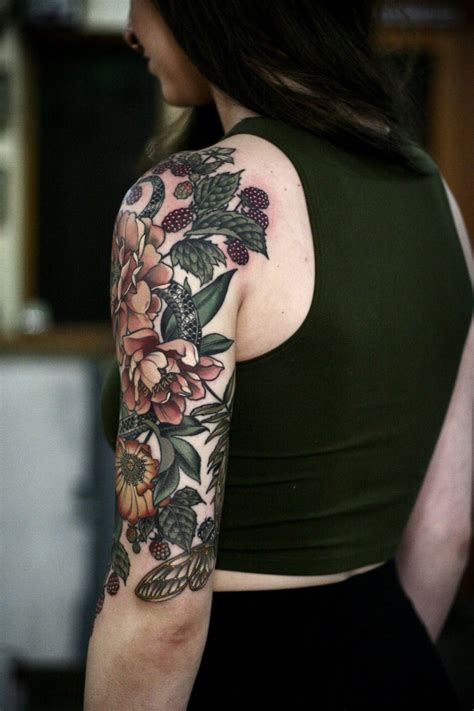 20 Vibrant Sleeve Tattoos For Women Skull Mingled With The Flowers And The Singing Birds