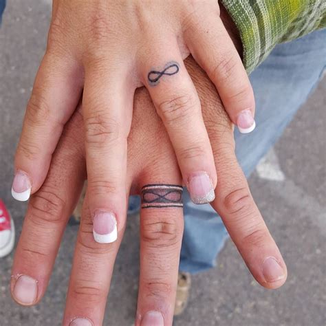 26 Charming Ring Tattoo Designs To Show Your Love And Commitment