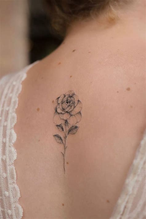 30 Beautiful Flower Tattoo Ideas A Beautiful Rose Tattoo On Spine I