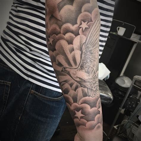 33 Amazing Cloud Background Tattoo Designs Ideas