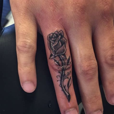 33 Beautiful Rose Finger Tattoos