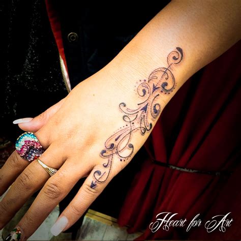 60 Attractive Hand Tattoos For Women