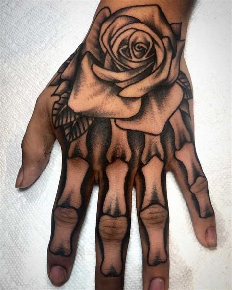 60 Skeleton Hand Tattoo Ideas And The Symbolism Behind Them Artofit