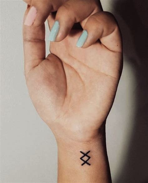 60 Small Tattoo Designs With Very Powerful Meanings Small Symbol Tattoos Cool Small Tattoos