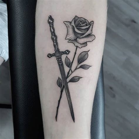 69 Cool Rose And Dagger Tattoo Ideas