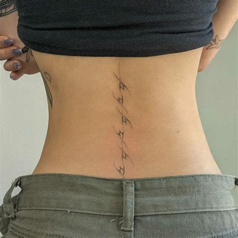 8 Lower Back Tattoo Ideas And Meanings