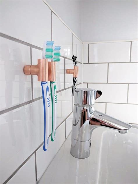 A Clever Storage Solution For Your Toothbrushes And Shavers Keep That