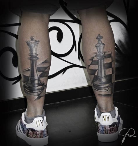 A Person With Tattoos On Their Legs Is Standing In Front Of A Chess Piece And The Word Ny