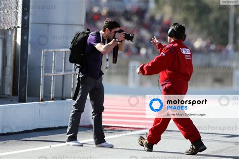 A Photographer Standing On The Track Is Ordered To Move Formula One