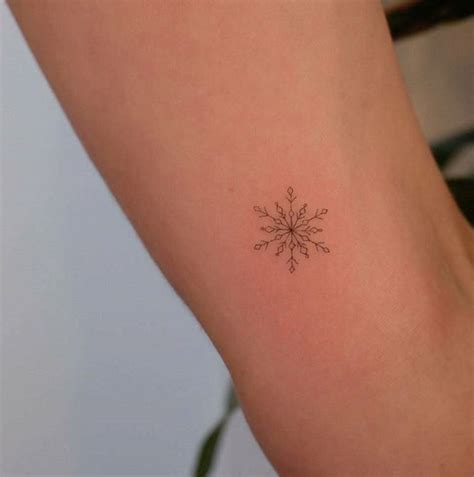 A Snowflake Snow Flake Tattoo Small Snowflake Tattoo Christmas Tattoo