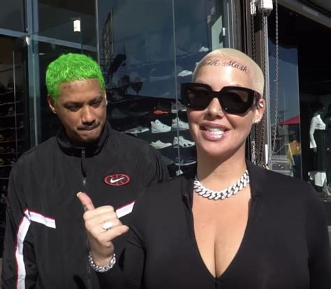 After Liposuction Amber Rose Gets A Forehead Tattoo Demotix Com