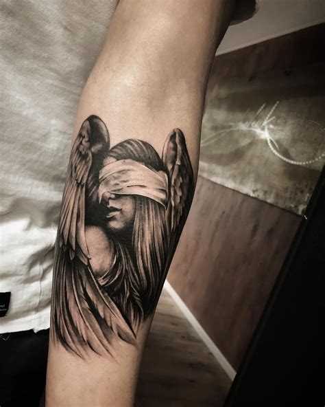 Angel Tattoos For Men And Women And The Meaning Of The Divine Symbol