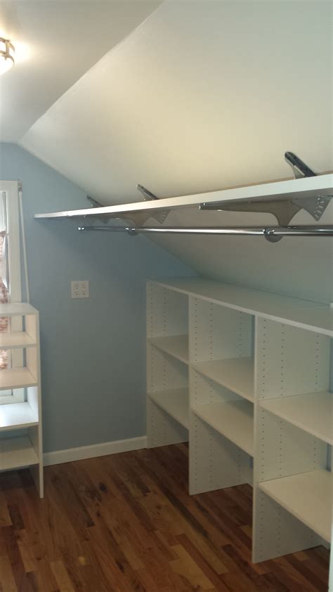 Angled Brackets Used To Maximize Space In Attic Closet With Images Attic Bedroom Closets