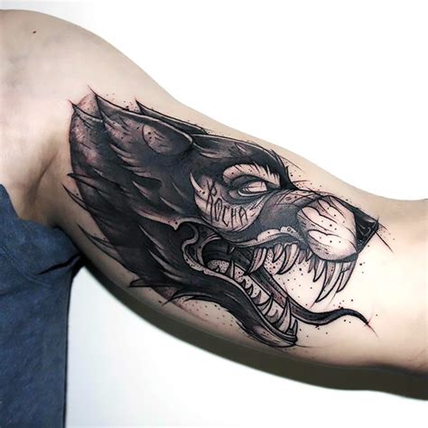 Best Sketch Style Wolf Tattoo On Bicep Tattoo Idea Tattoos For Guys Badass Bicep Tattoo Wolf