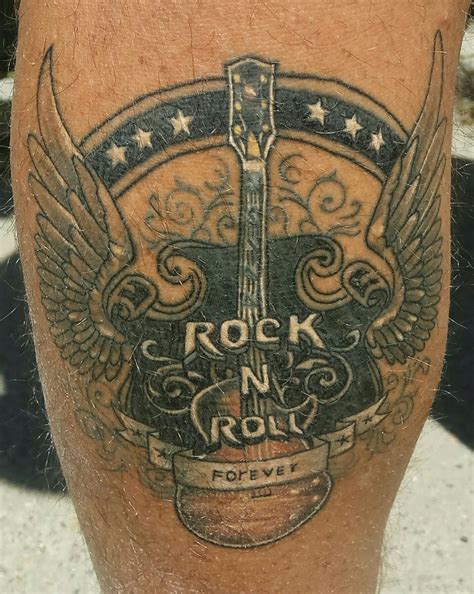 Black And Grey Rock And Roll Tattoo Blackink Ai