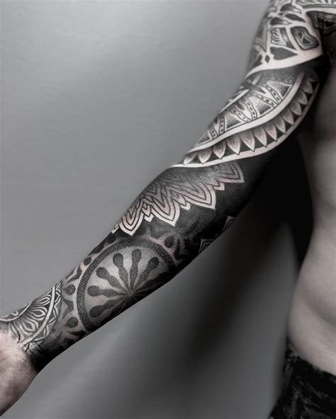 Blackout Tattoo with White Design: A Bold Contrast Style