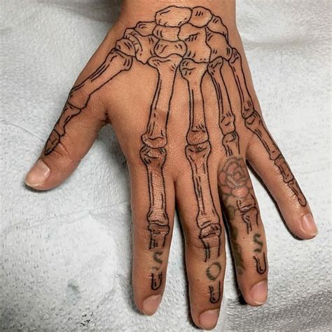 Bone Hand Tattoo Designs