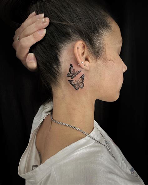 Butterfly Behind Ear Tattoo