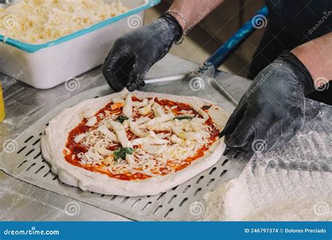 Chef Specialized In Neapolitan Pizzas Preparing The Dough Stock Photo