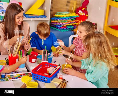 Children And Teacher Are Engaged In Education Creative Activities Stock Photo Alamy