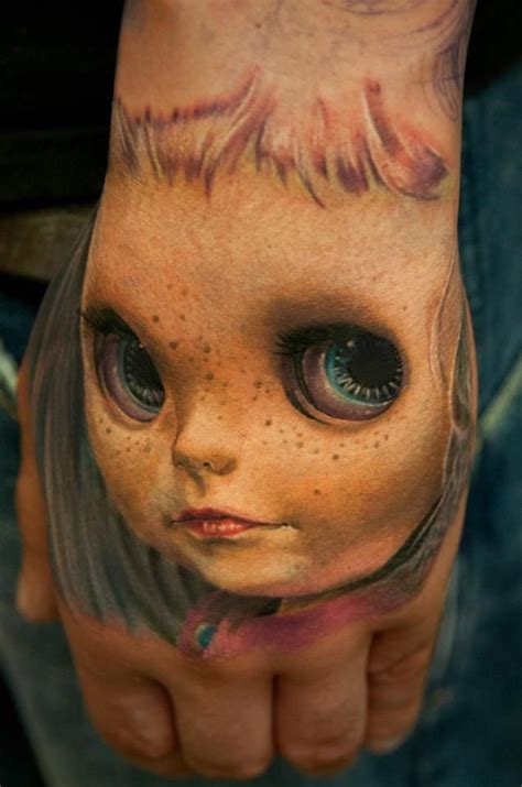 Creepy Doll Tattoo Designs to Haunt Your Skin