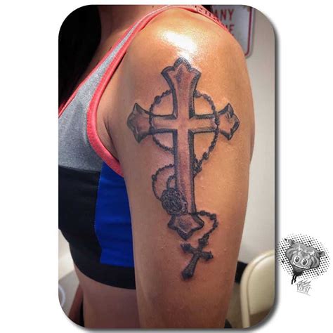 Cross Tattoo Arm Designs and Meanings for Men