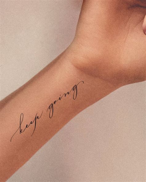 10 Cursive Design Tattoos to Inspire Your Next Ink