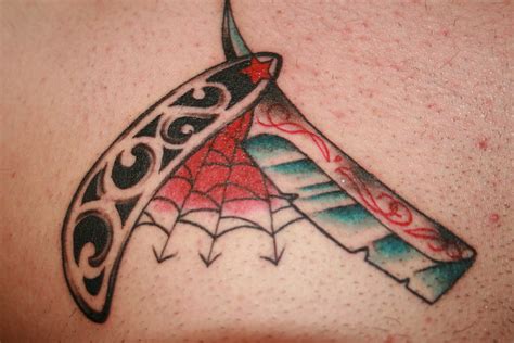 5 Ways Cut Throat Tattoos Take Design to Extremes