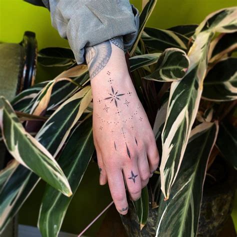 10 Tiny Hand Tattoo Ideas You'll Adore