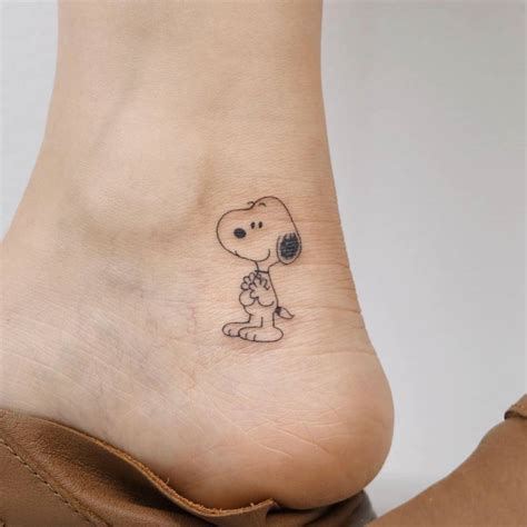 Snoopy Tattoo Ideas for Loyal Peanuts Fans