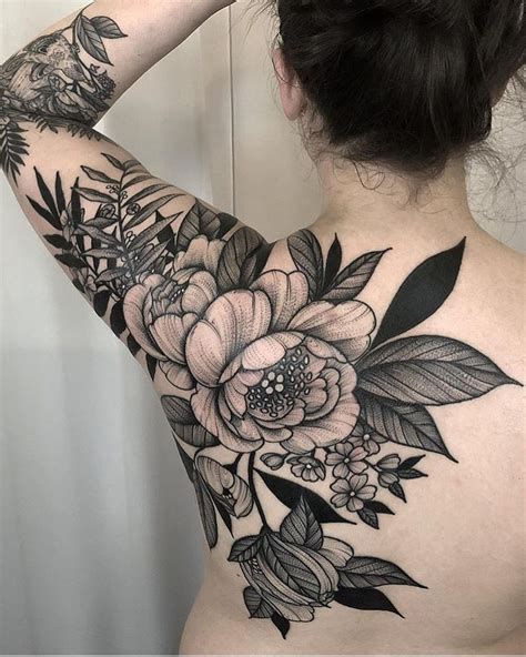 Dark Flower Tattoo Designs: Blooming Beauty in Ink