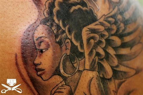 Details 69 Afro Angel Tattoo Latest In Cdgdbentre