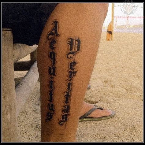 Exotic Aequitas Veritas Lower Leg Tattoo Design Idea For Men