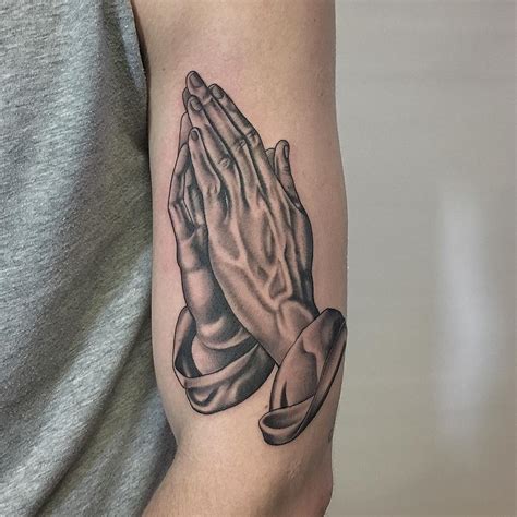 Exploring The Meaning And Popularity Of Prayer Hands Tattoo