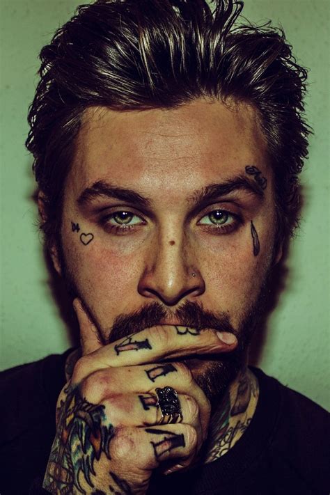 10 Face Tattoo Designs for Men That Exude Style