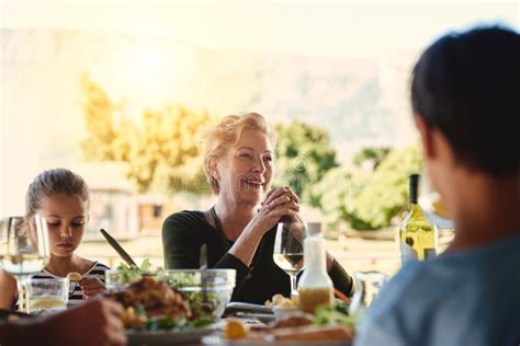 Family Makes Time For Each Other A Happy Family Enjoying Lunch