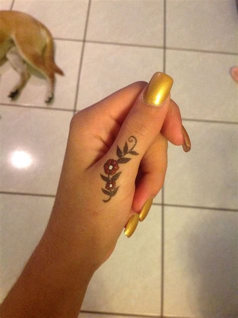 10 Small Female Thumb Tattoo Designs You'll Love