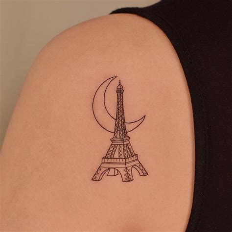 Fine Line Eiffel Tower Tattoo On The Shoulder