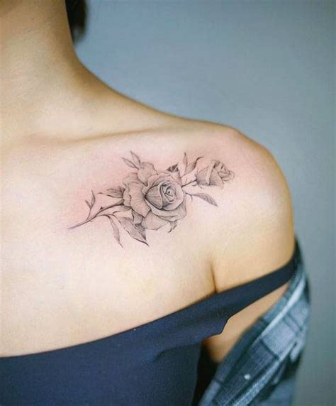 Fine Line Rose Tattoo On The Top Of The Shoulder