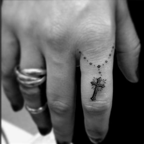 Finger Cross Tattoo Designs for Faith and Style