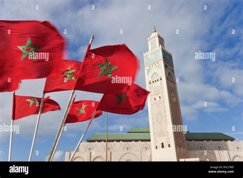 Flags Of Morocco Waving In The Wind And Hassan Ii Mosque The Third