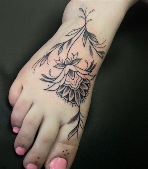 Delicate Flower Tattoo Designs for Your Foot