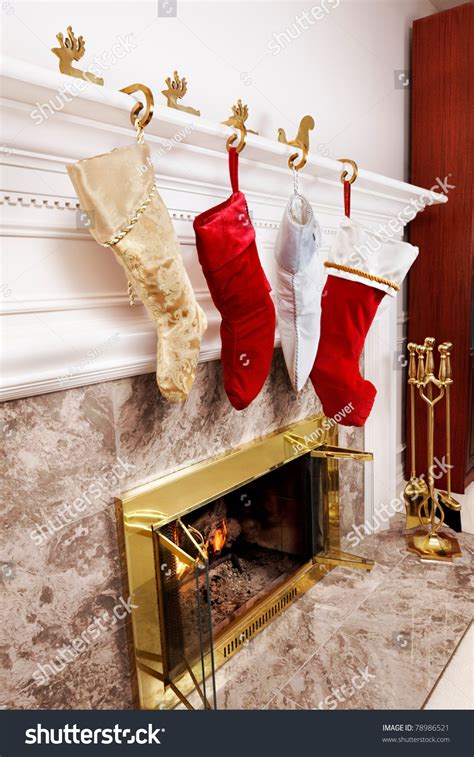 Four Christmas Stockings Hanging Fireplace Stock Photo 78986521