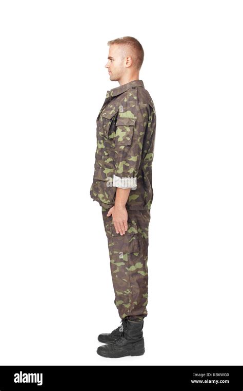 Full Body Side View Of Army Soldier Standing In Attention Stock Photos