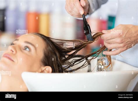 Hairdresser Washes Customer Hair In Basin Stock Image Image Of