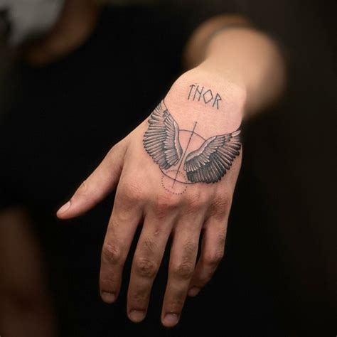 Hand Holding Something Tattoo 15 Unique Designs You Ll Want To Get