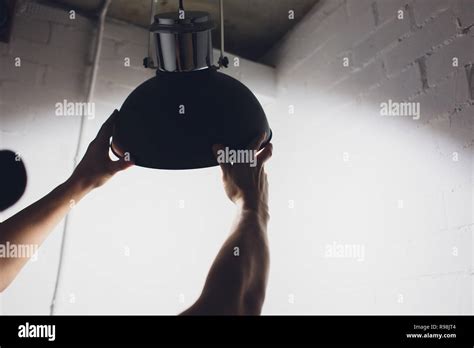 Hands Changing With New Led Lamp Light Bulb Power Saving Concept Stock Photo Alamy